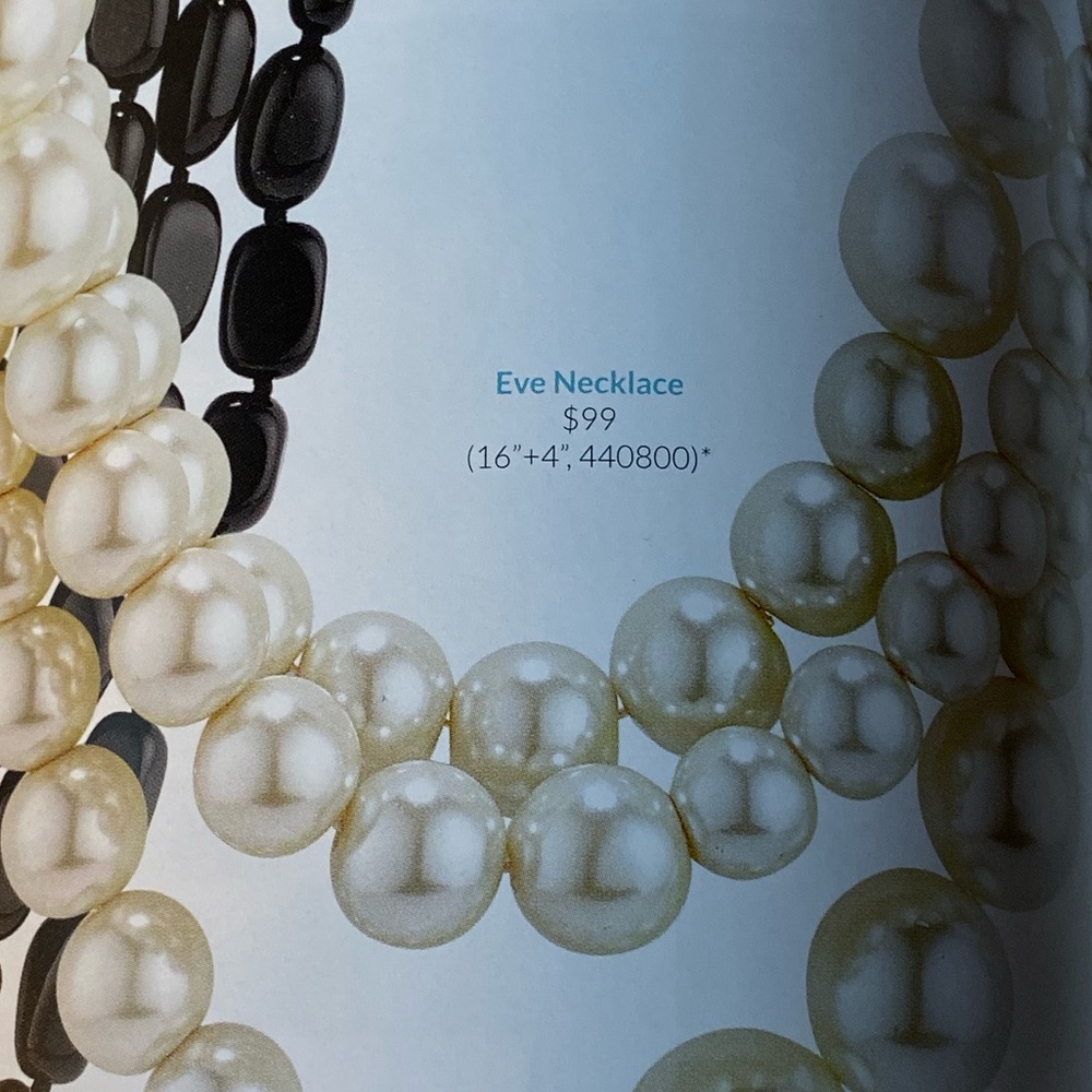 Triple strand pearl necklace